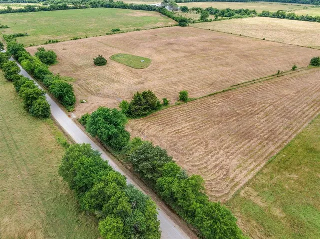 a view of a backyard of a house