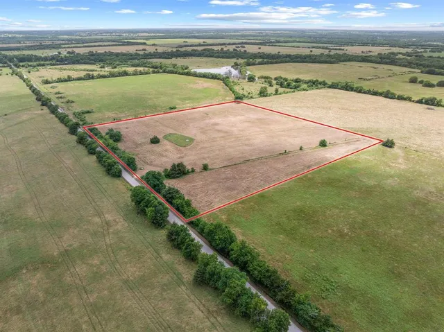 a view of an outdoor space and tennis court