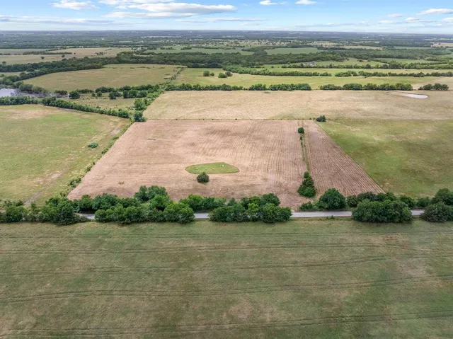 a view of lake with mountain in the background