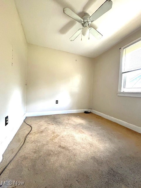 14628 Granger Road Maple Heights, OH 44137 - Photo 32 of 45 Carpeted spare room with ceiling fan