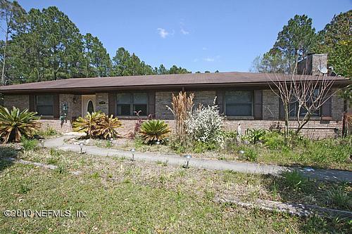 1295 Marlee Road St. Johns, FL 32259 - Photo 1 of 16 a front view of a house with garden