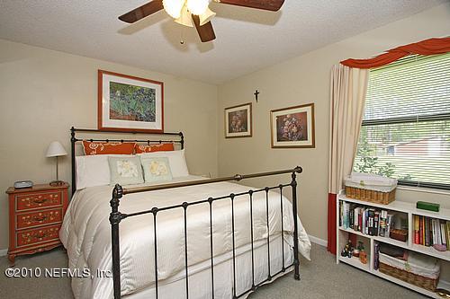 1295 Marlee Road St. Johns, FL 32259 - Photo 8 of 16 a bedroom with furniture and a window