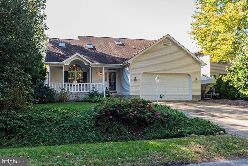 18 Brookside Road Berlin, MD 21811 - Photo 1 of 48 a front view of a house with a garden