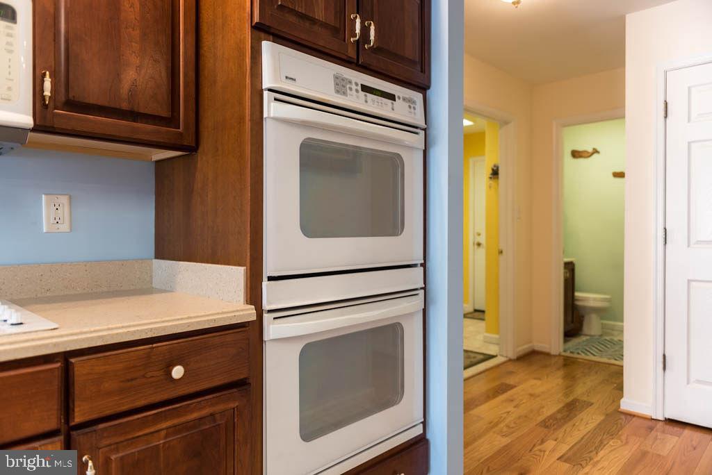 18 Brookside Road Berlin, MD 21811 - Photo 13 of 48 a kitchen with a refrigerator sink and cabinets