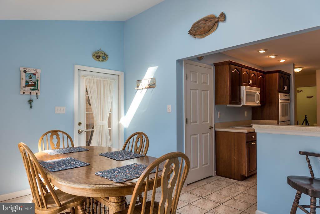 18 Brookside Road Berlin, MD 21811 - Photo 15 of 48 a dining room with furniture and window