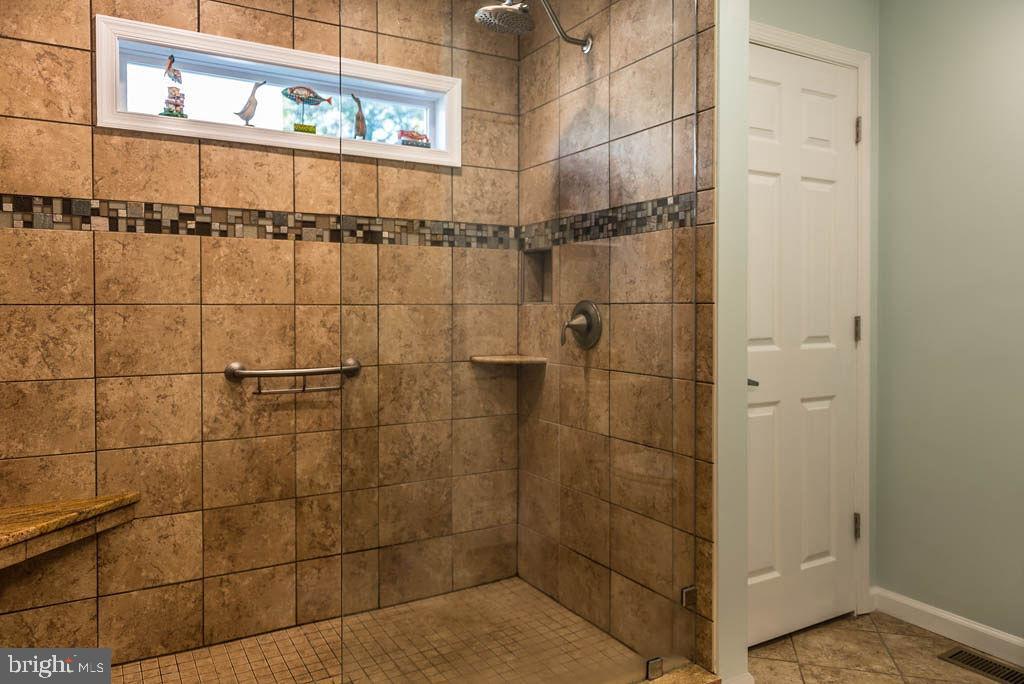 18 Brookside Road Berlin, MD 21811 - Photo 20 of 48 a bathroom with a shower