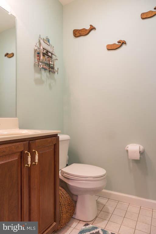 18 Brookside Road Berlin, MD 21811 - Photo 22 of 48 a bathroom with a toilet and a sink