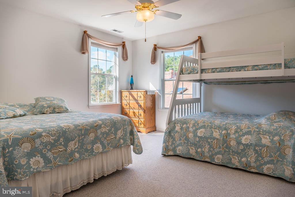 18 Brookside Road Berlin, MD 21811 - Photo 25 of 48 a bedroom with two beds and window