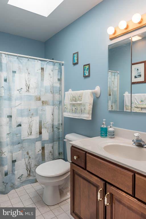 18 Brookside Road Berlin, MD 21811 - Photo 29 of 48 a bathroom with a sink a toilet and shower