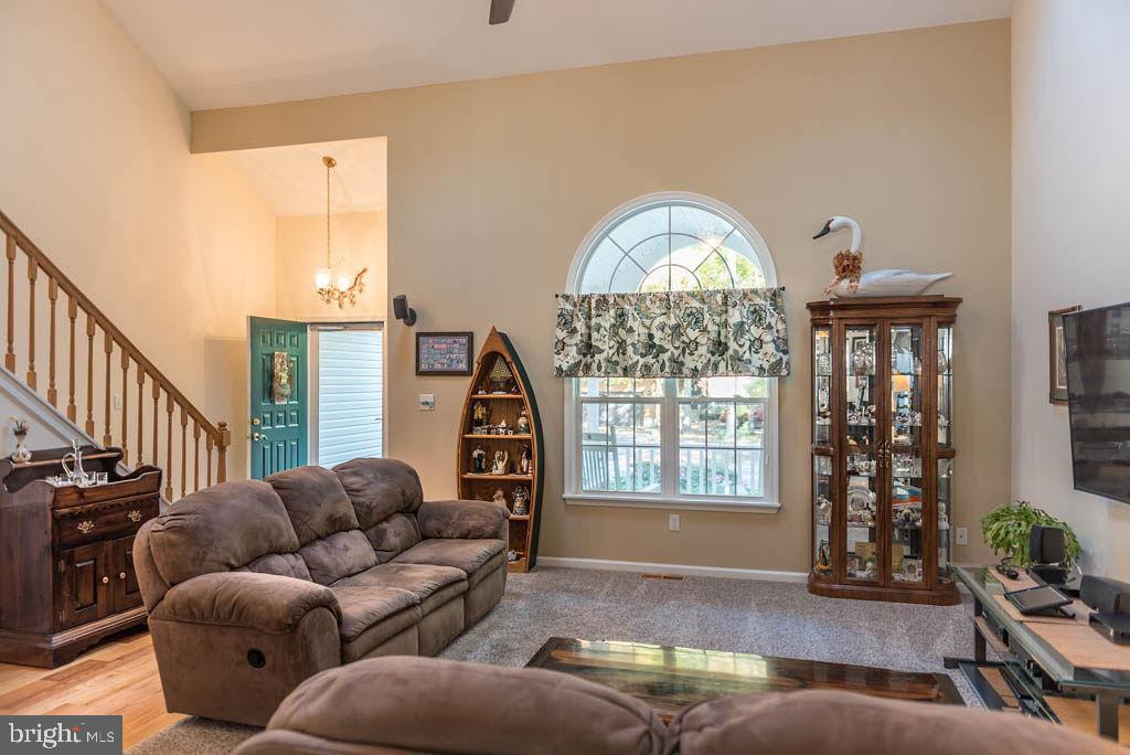 18 Brookside Road Berlin, MD 21811 - Photo 5 of 48 a living room with furniture and a large window