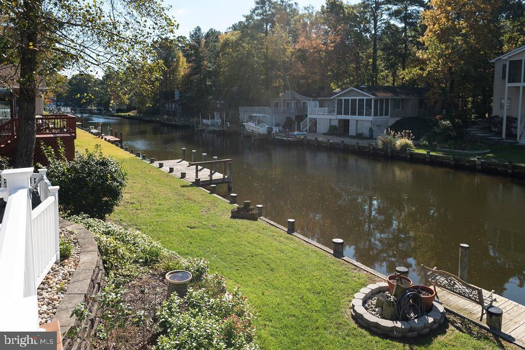 18 Brookside Road Berlin, MD 21811 - Photo 41 of 48 a view of a lake with a house in the background