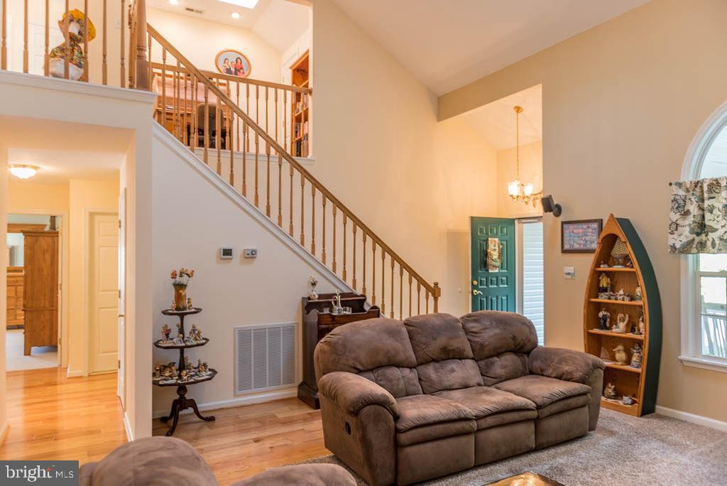 18 Brookside Road Berlin, MD 21811 - Photo 6 of 48 a living room with furniture and wooden floor