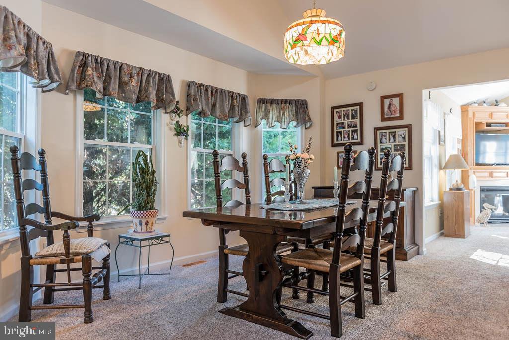 18 Brookside Road Berlin, MD 21811 - Photo 9 of 48 a view of a dining room with furniture window and outside view