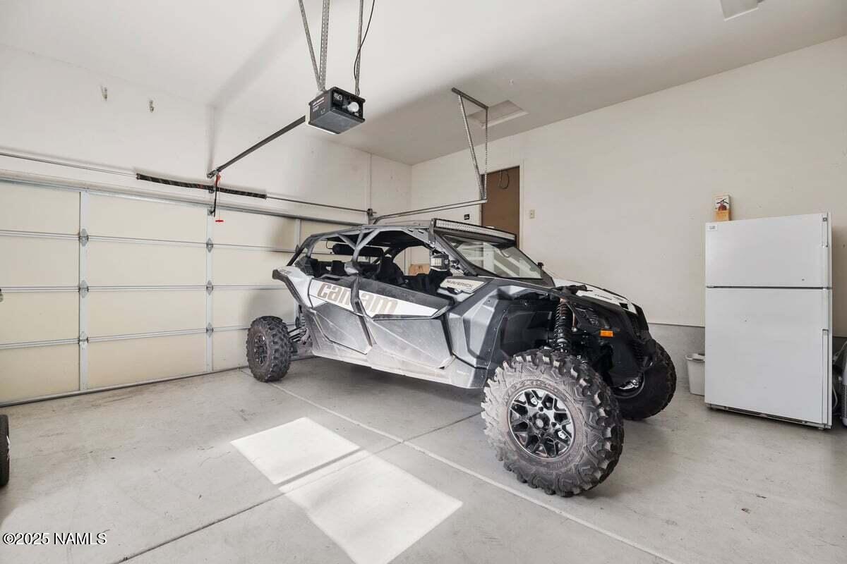 865 Caribou Road Munds Park, AZ 86017 - Photo 20 of 24 a view of a garage with storage