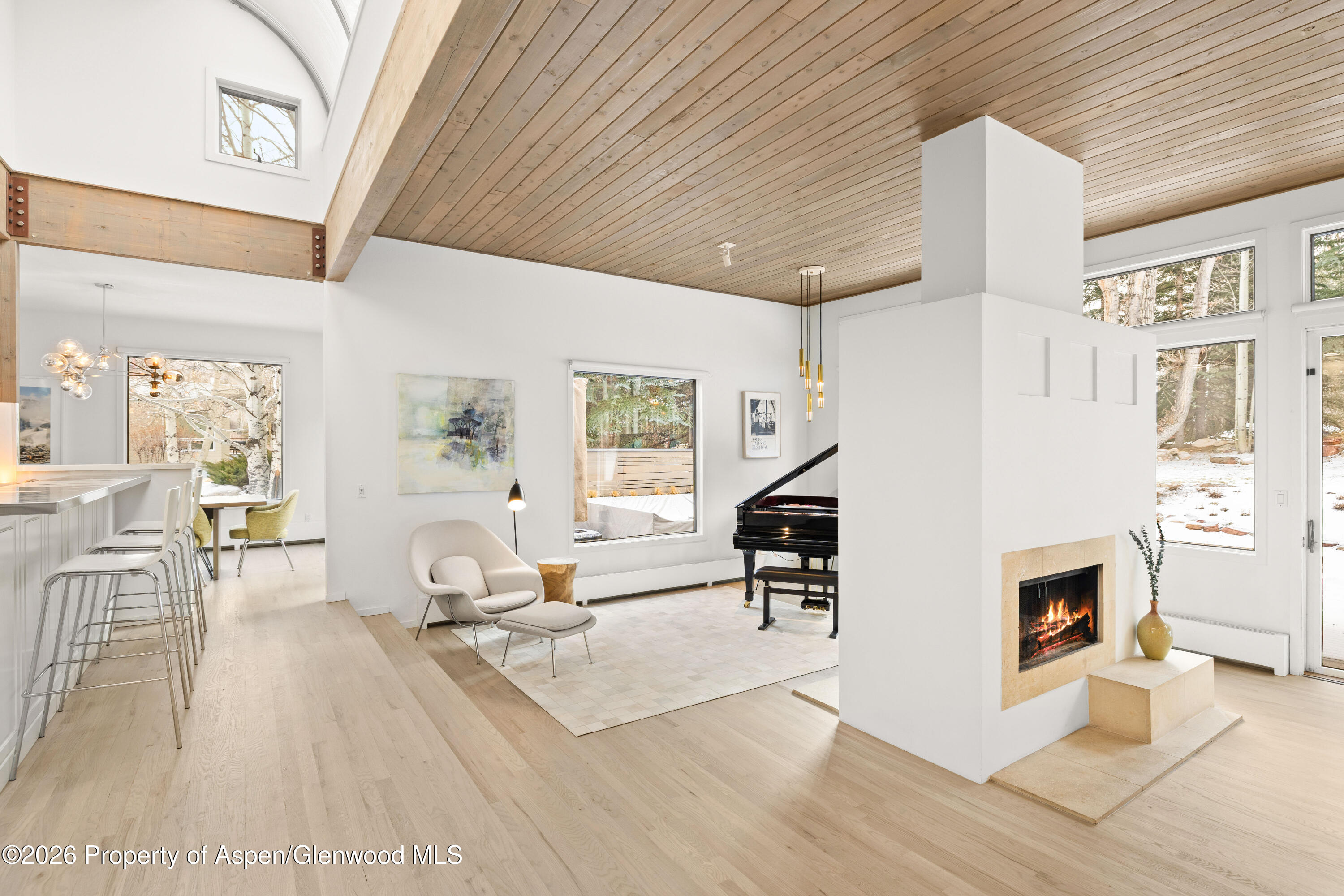 a living room with furniture and a table