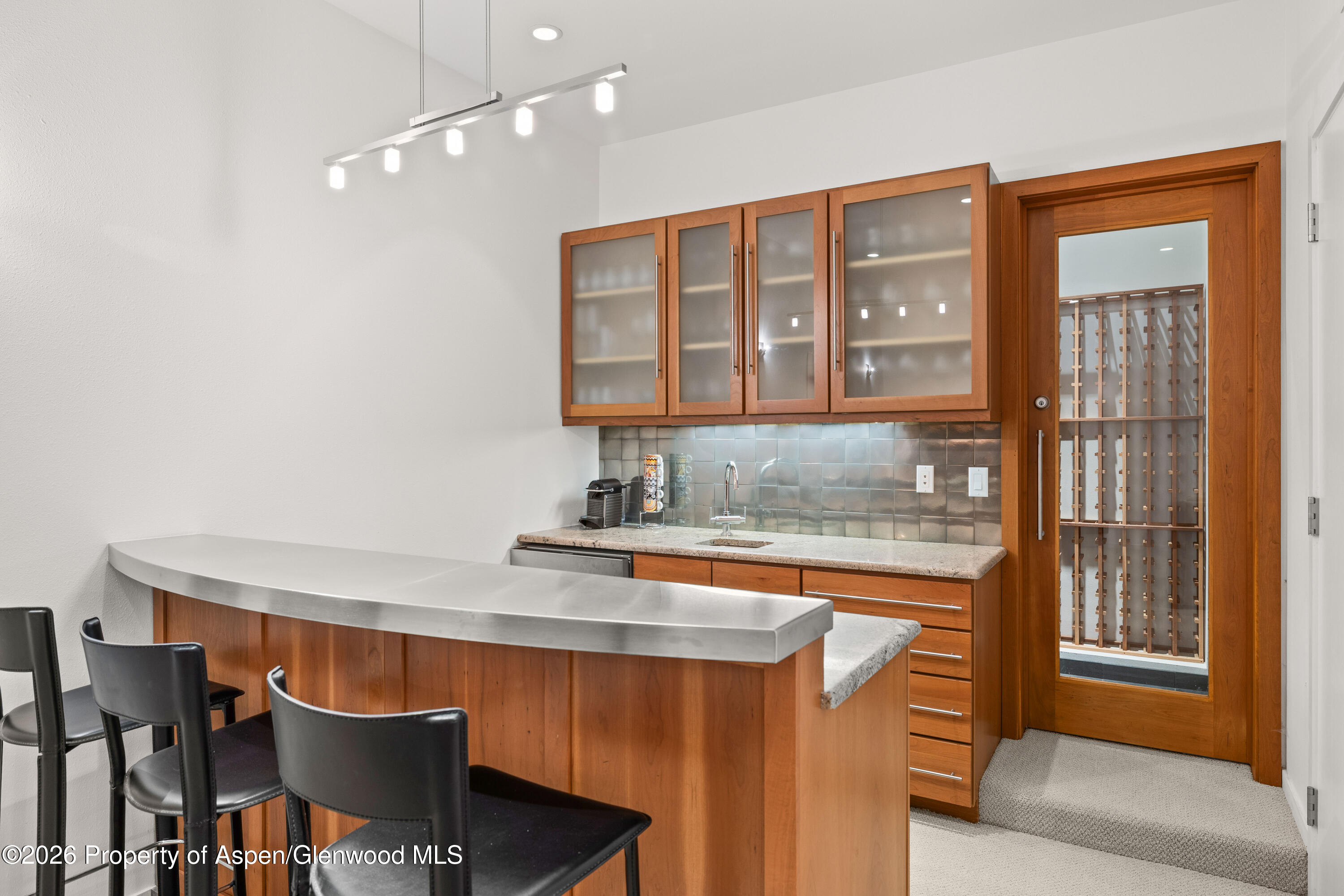 55 Overlook Drive Aspen, CO 81611 - Photo 18 of 25 a kitchen with a sink cabinets and window