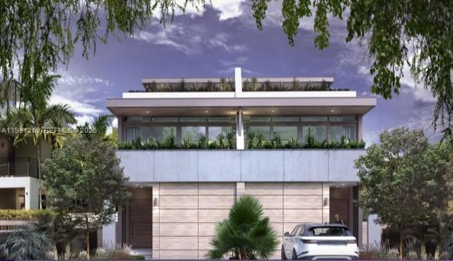 6021 Southwest 76th Street South Miami, FL 33143 - Photo 2 of 8 a view of building with yard and outdoor seating