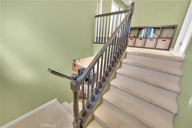 a view of hallway with windows