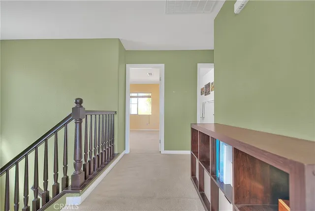 a bathroom with a sink vanity and mirror