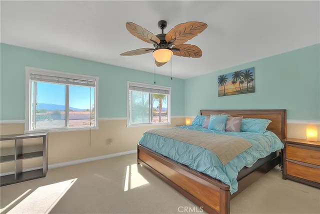a bathroom with a bathtub and a window