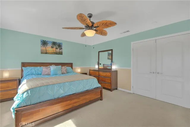 a view of a livingroom with furniture and chandelier