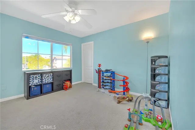 a swimming pool with outdoor seating and yard