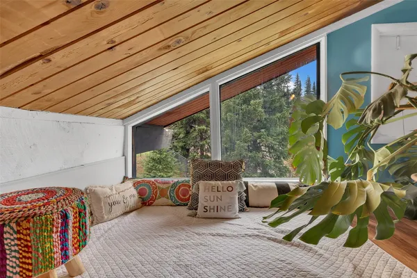 a outdoor living space with furniture and garden view
