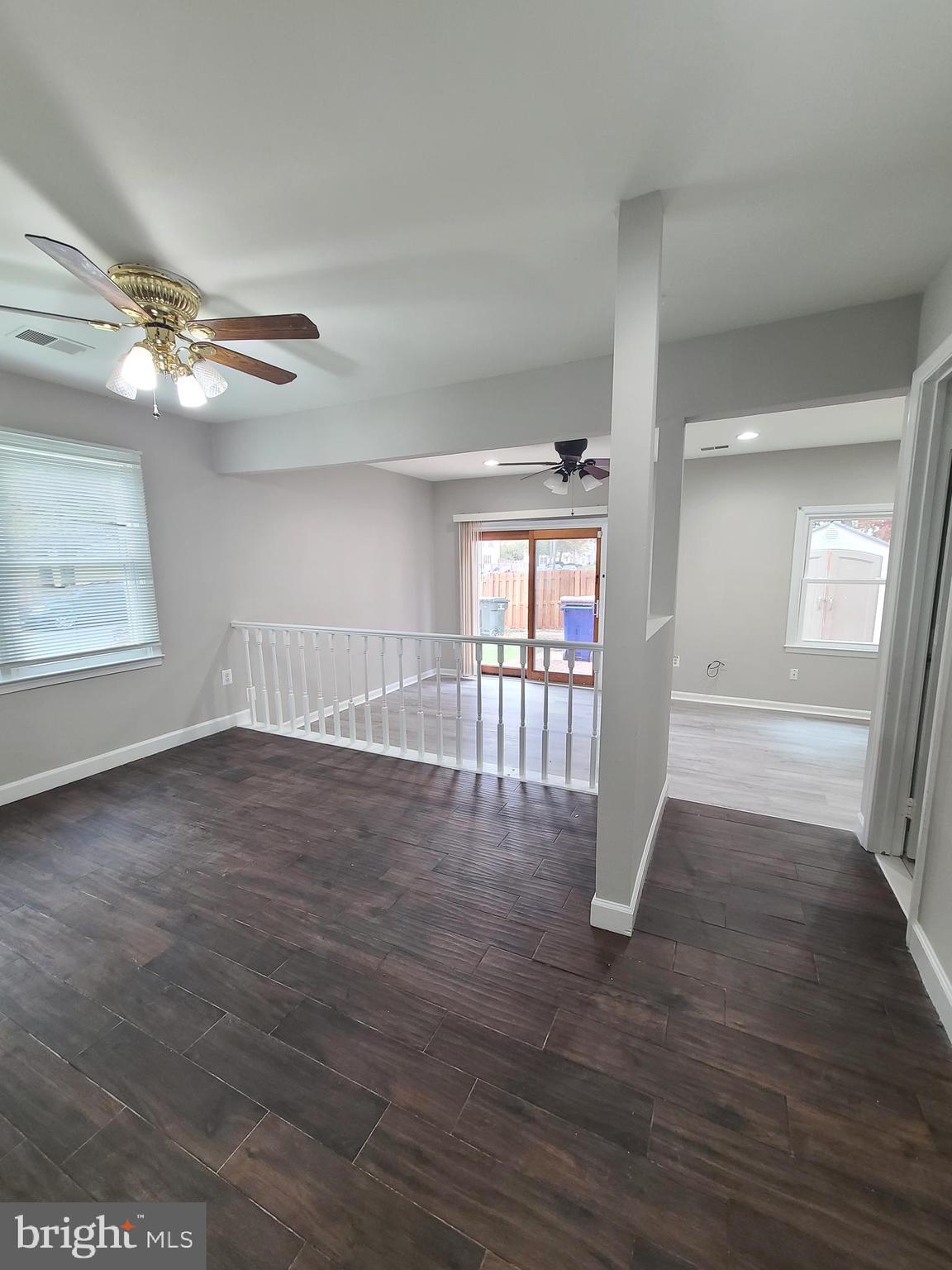 9050 Reynolds Place Manassas, VA 20110 - Photo 11 of 26 wooden floor in an empty room with a window