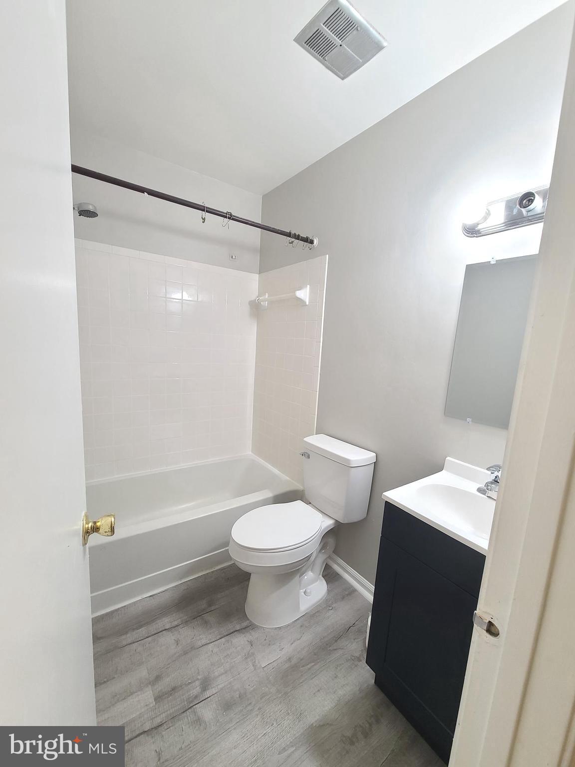 9050 Reynolds Place Manassas, VA 20110 - Photo 24 of 26 a bathroom with a toilet and a shower