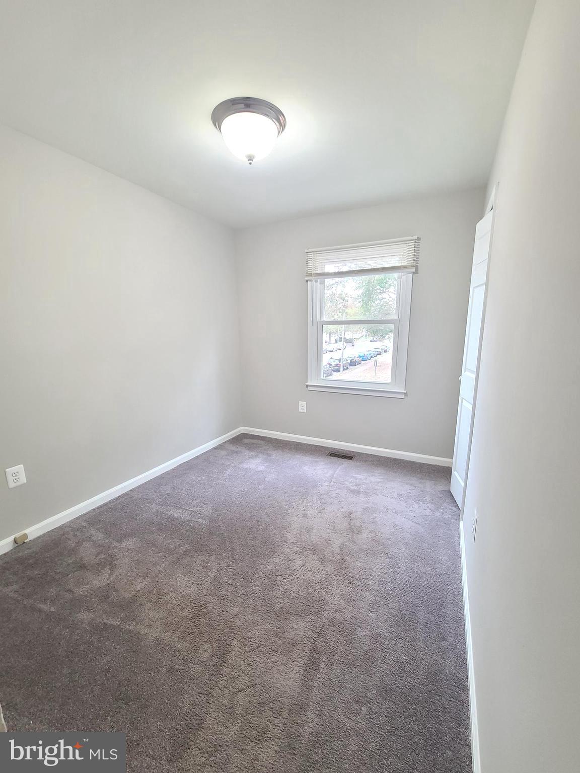9050 Reynolds Place Manassas, VA 20110 - Photo 26 of 26 an empty room with windows
