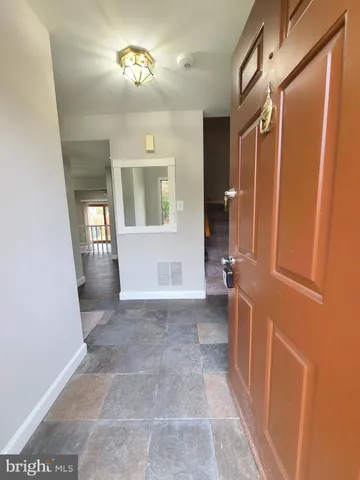 a view of an entryway with a livingroom