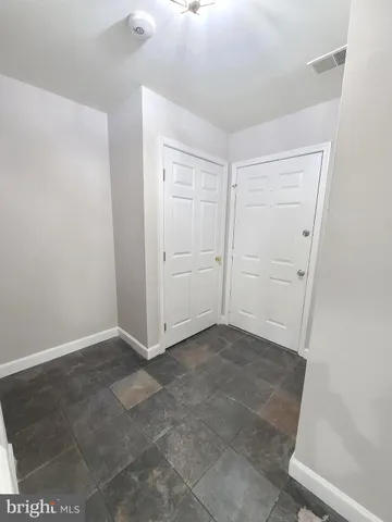 an empty room with closet