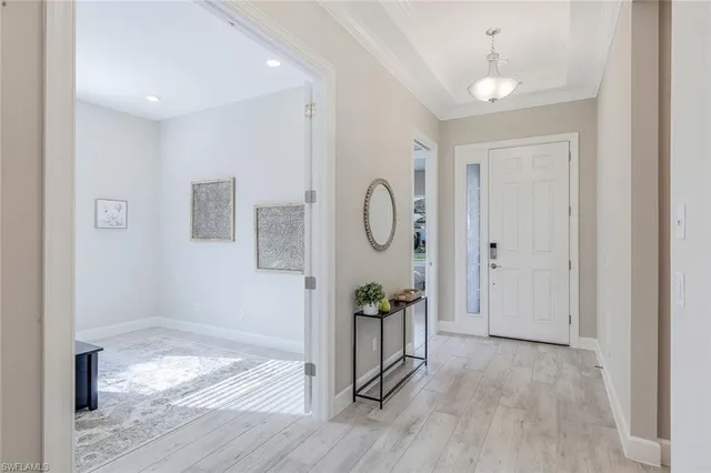 a view of entryway with wooden floor