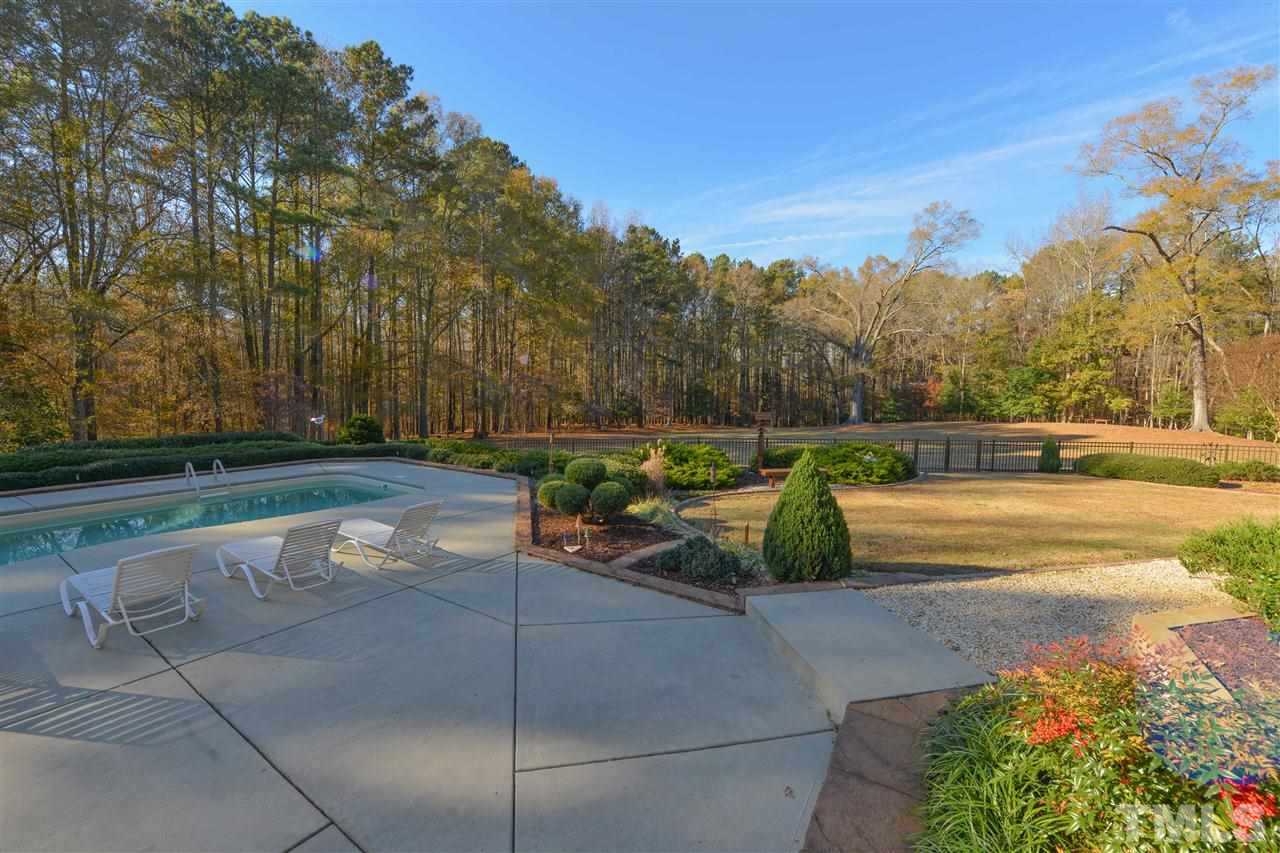202 Clover Ridge Angier, NC 27501 - Photo 23 of 25 This pool was chosen for maximum enjoyment and minimum upkeep. It’s a fiberglass pool with a built-in self-cleaning system that continuously sweeps and cleans the pool. No vacuuming needed, no brushing needed. It has a saltwater chlorinating system.
