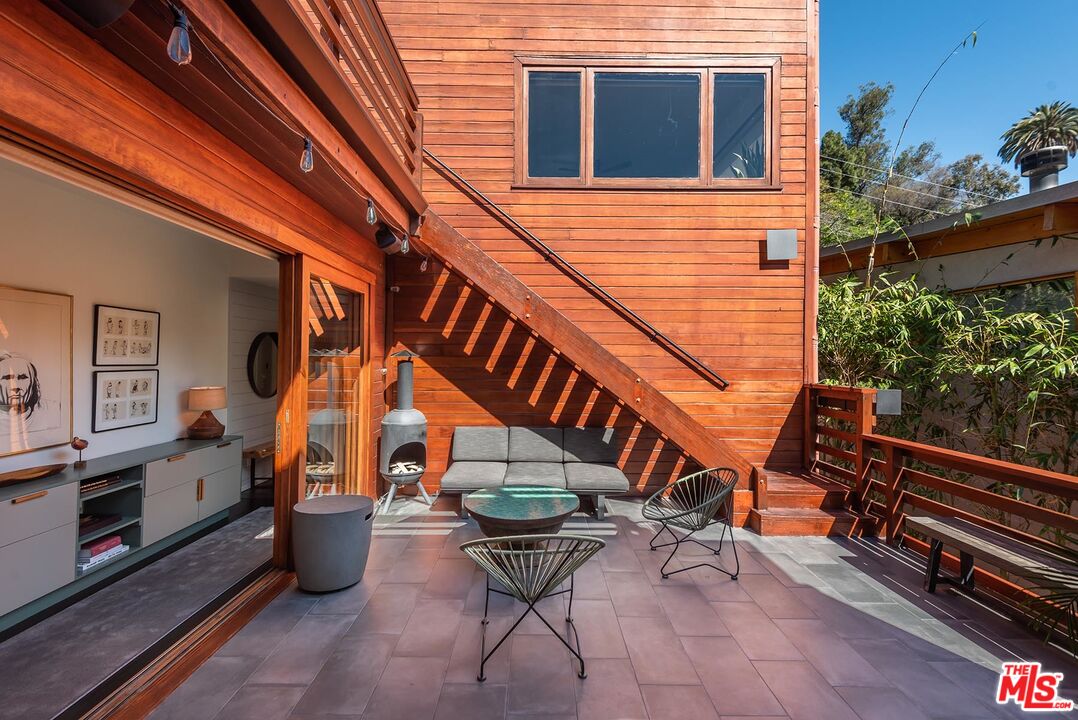 8544 Ridpath Drive West Hollywood, CA 90046 - Photo 12 of 34 a view of an outdoor sitting area with wooden walls
