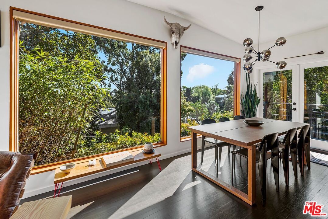 8544 Ridpath Drive West Hollywood, CA 90046 - Photo 14 of 34 a view of a room with a table and chairs