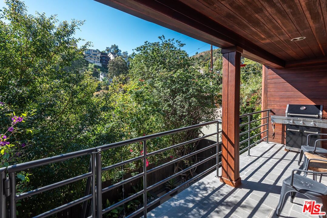 8544 Ridpath Drive West Hollywood, CA 90046 - Photo 15 of 34 a view of a balcony with chairs