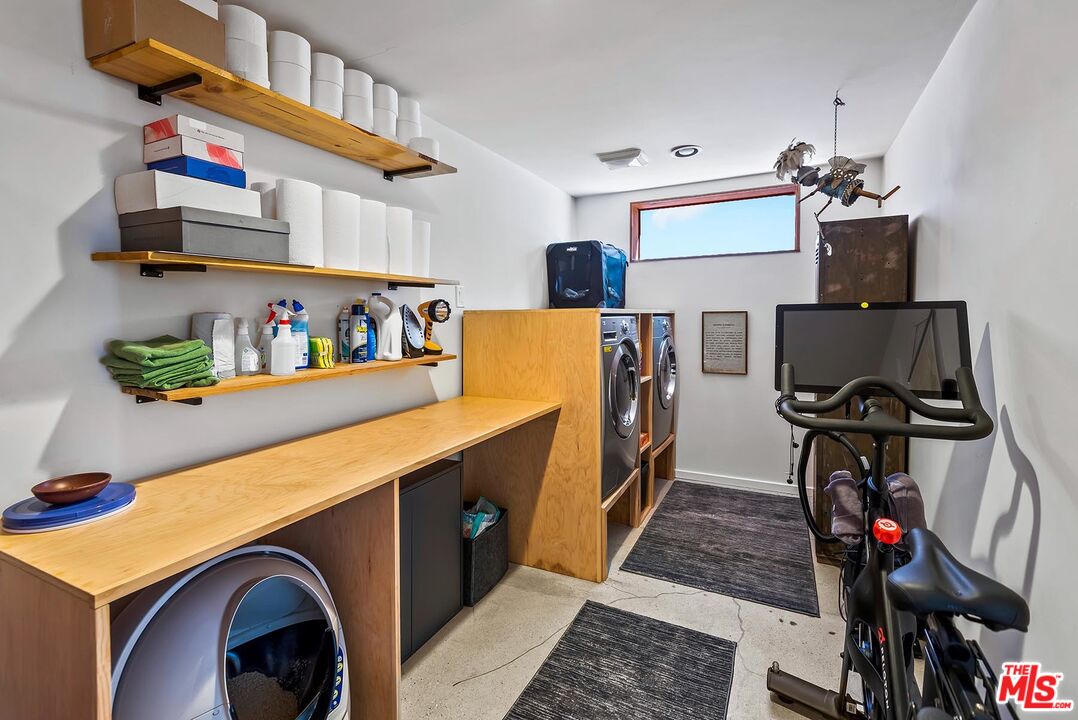 8544 Ridpath Drive West Hollywood, CA 90046 - Photo 27 of 34 a utility room with dryer and washer
