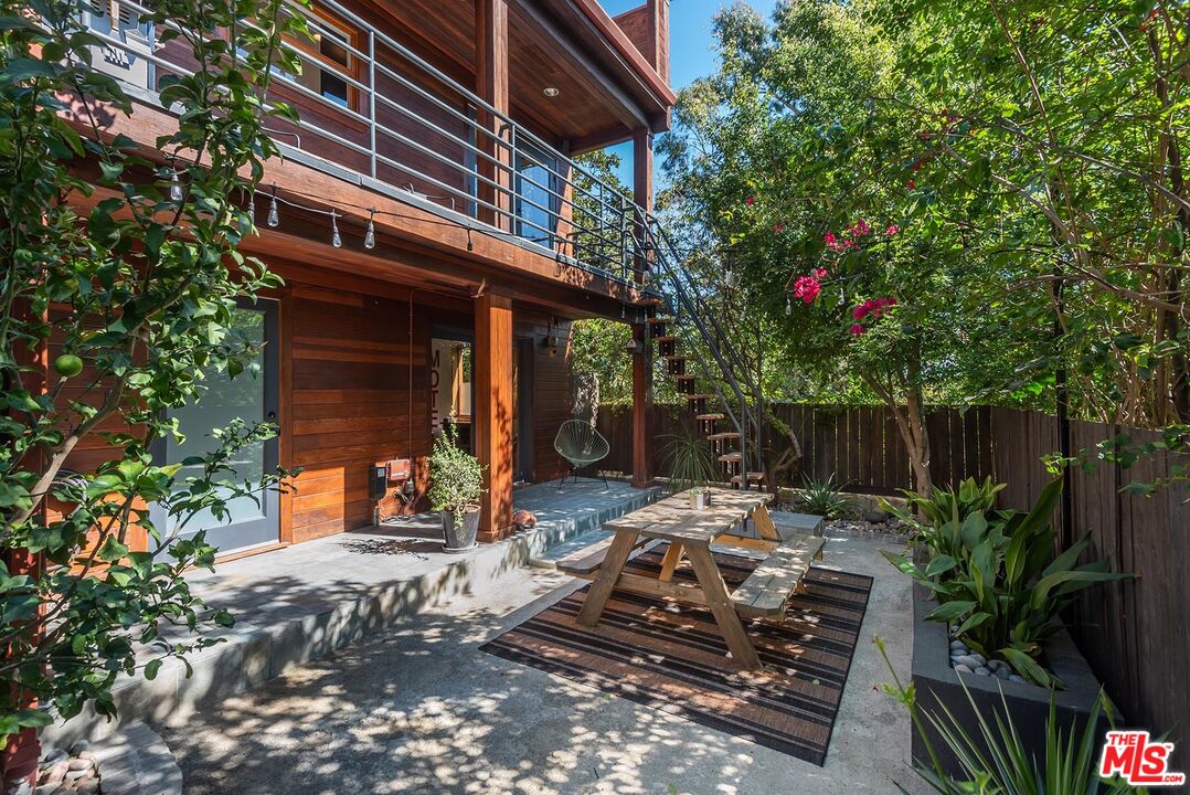 8544 Ridpath Drive West Hollywood, CA 90046 - Photo 29 of 34 a backyard of a house with seating space