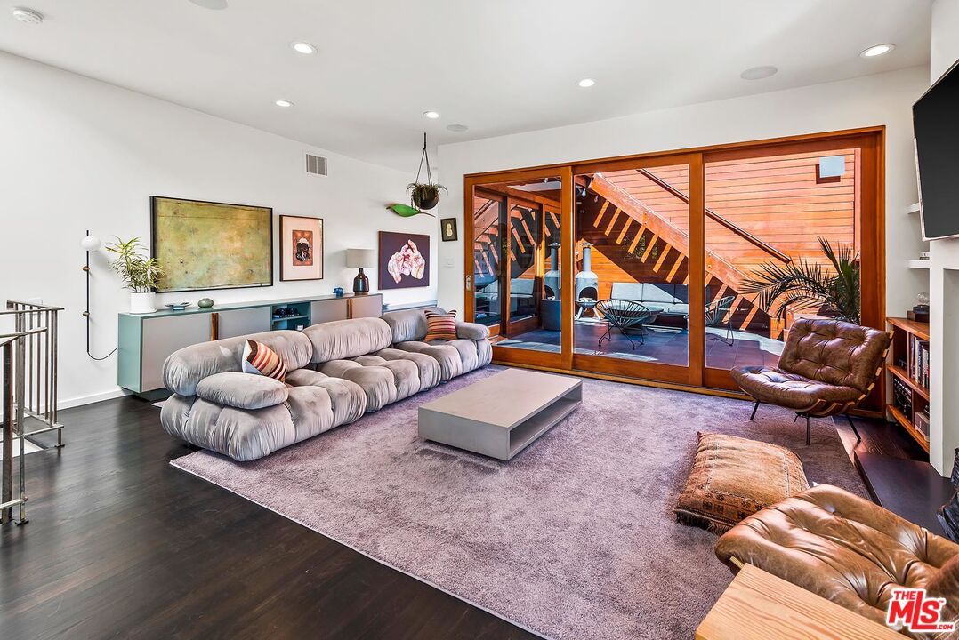 8544 Ridpath Drive West Hollywood, CA 90046 - Photo 6 of 34 a living room with furniture and a large window