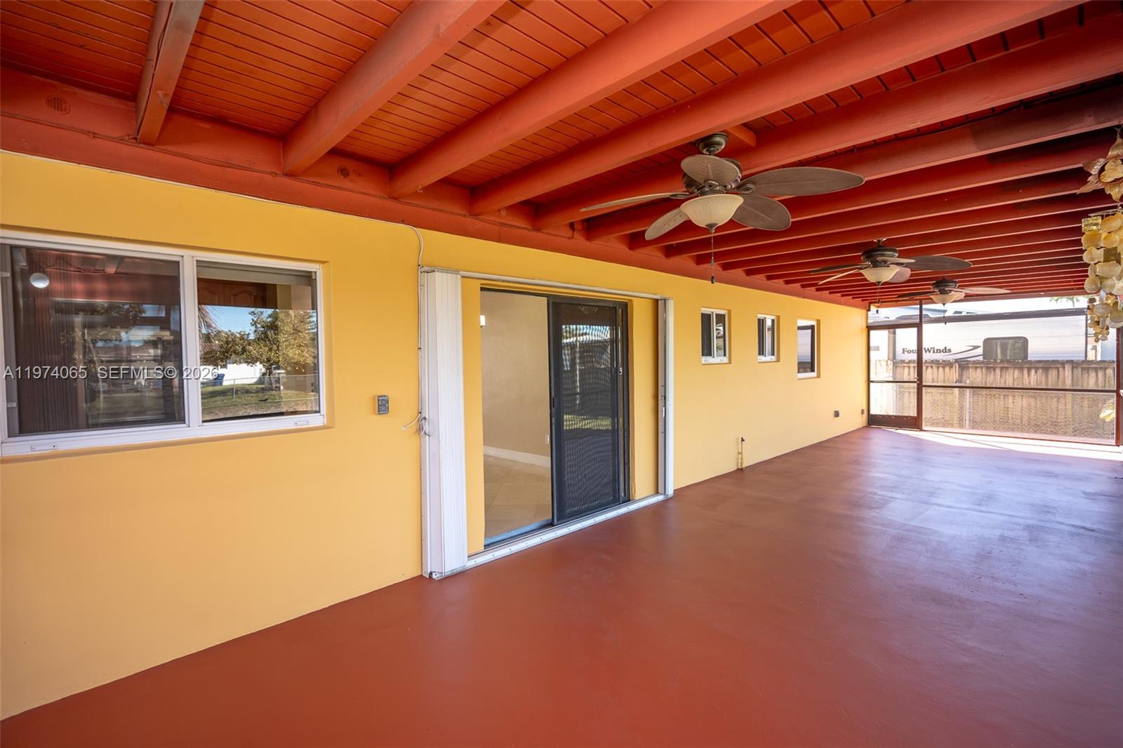 4600 Southwest 104th Avenue Miami, FL 33165 - Photo 12 of 40 a view of an empty room with a window