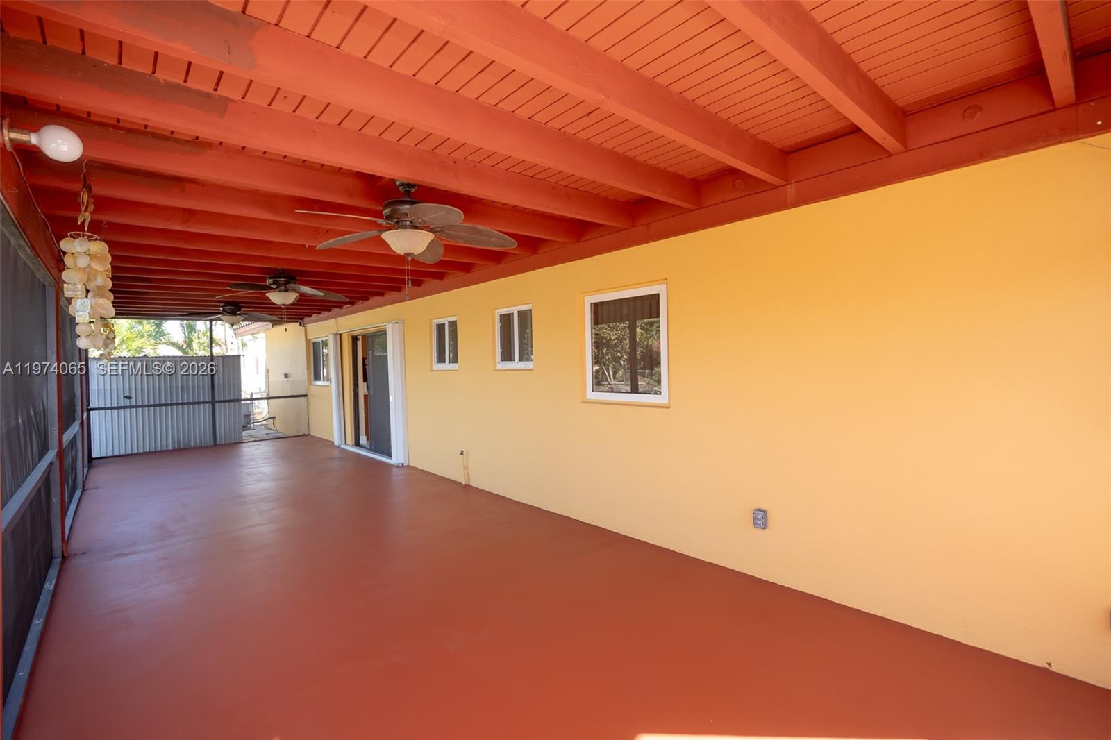 4600 Southwest 104th Avenue Miami, FL 33165 - Photo 13 of 40 a view of empty room with wooden floor and fan