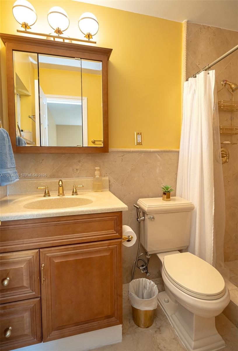 4600 Southwest 104th Avenue Miami, FL 33165 - Photo 21 of 40 a bathroom with a sink and a toilet