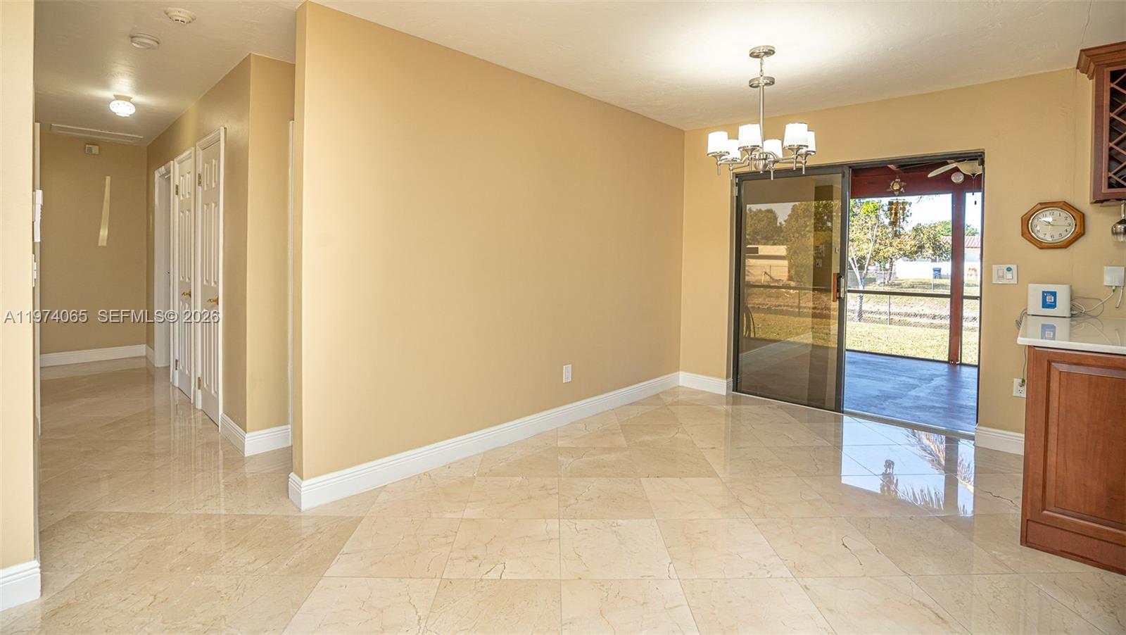4600 Southwest 104th Avenue Miami, FL 33165 - Photo 23 of 40 a view of livingroom with kitchen