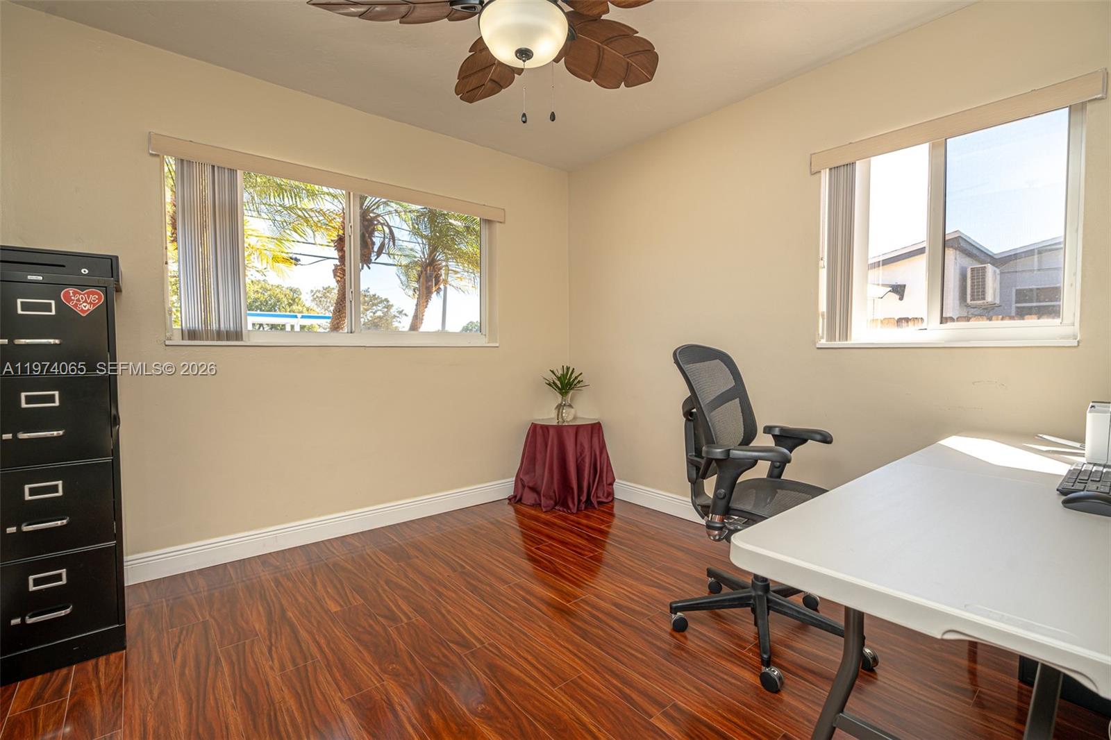 4600 Southwest 104th Avenue Miami, FL 33165 - Photo 27 of 40 a workspace with wooden floor