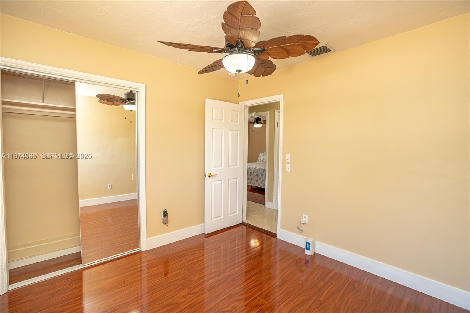 4600 Southwest 104th Avenue Miami, FL 33165 - Photo 30 of 40 a view of empty room with wooden floor