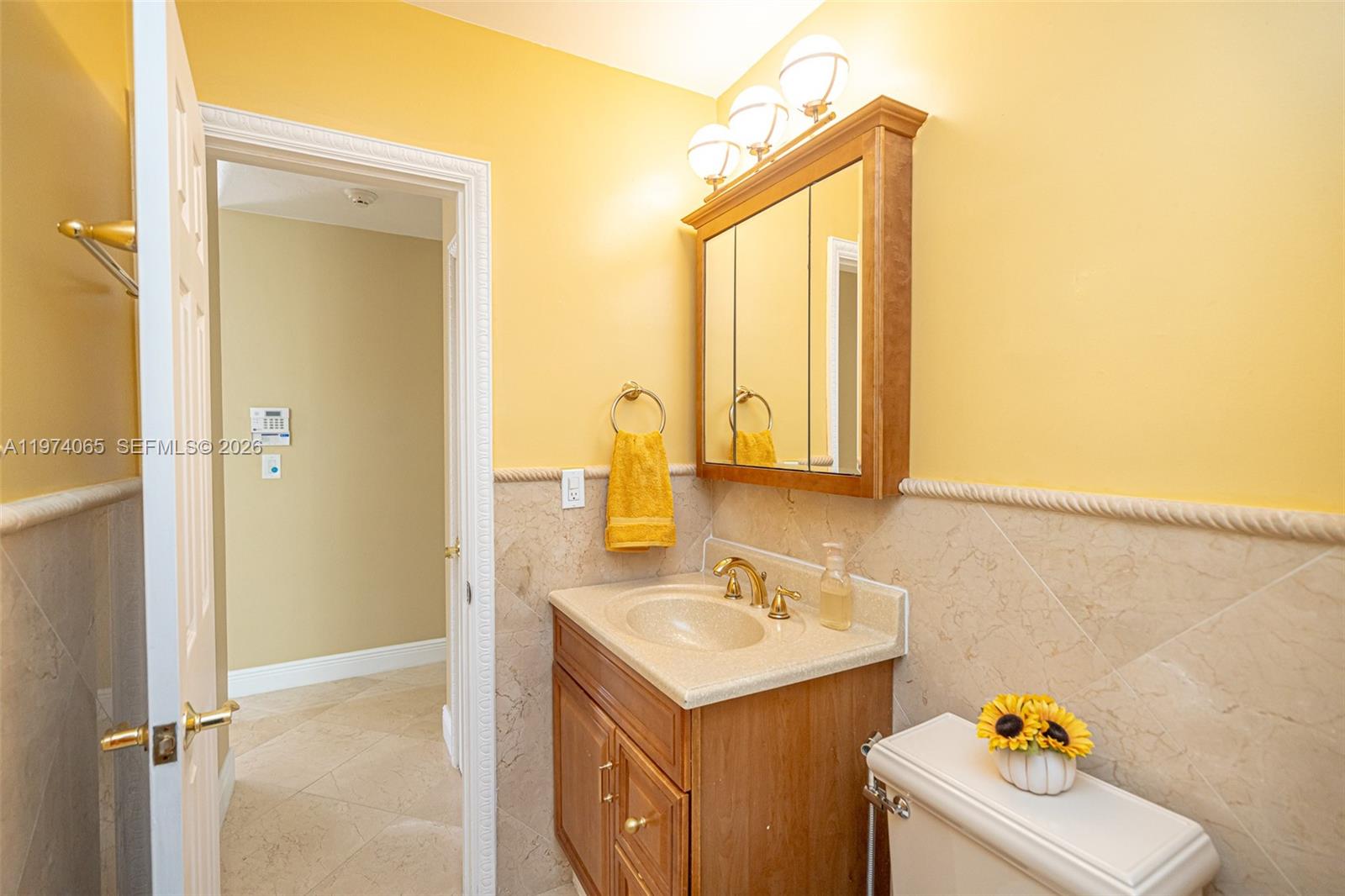 4600 Southwest 104th Avenue Miami, FL 33165 - Photo 31 of 40 a bathroom with a sink mirror vanity and bathtub
