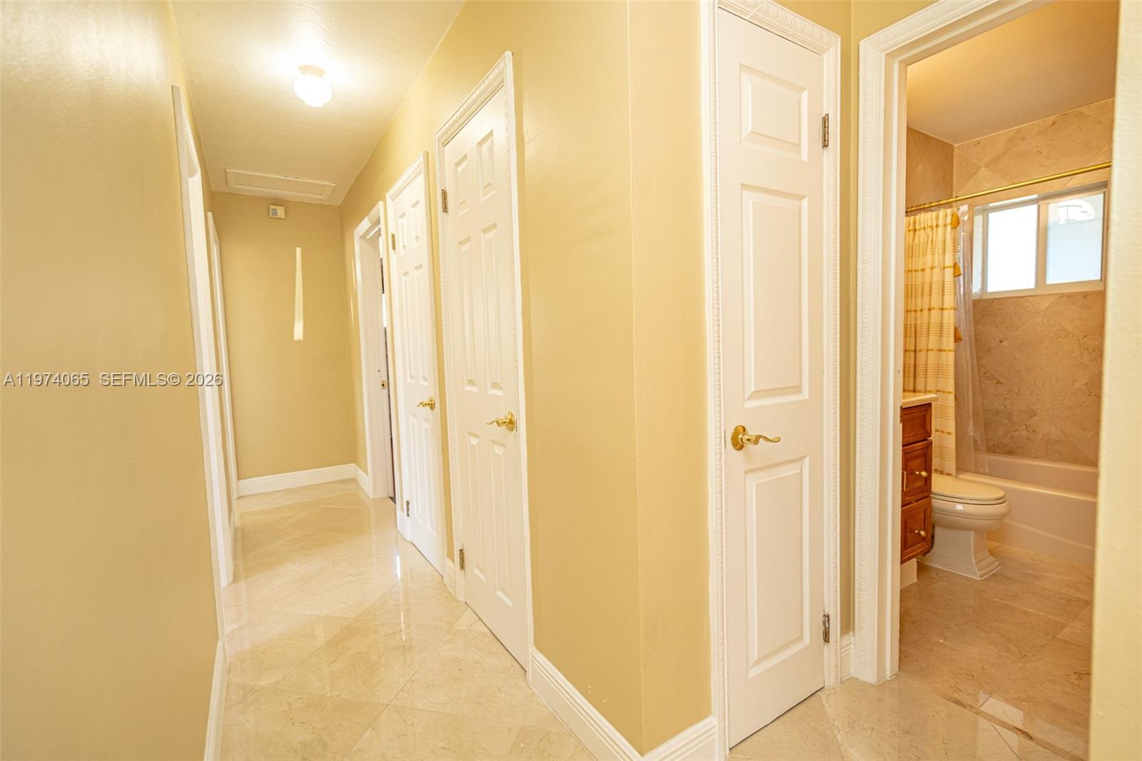 4600 Southwest 104th Avenue Miami, FL 33165 - Photo 33 of 40 a view of a bathroom from a hallway