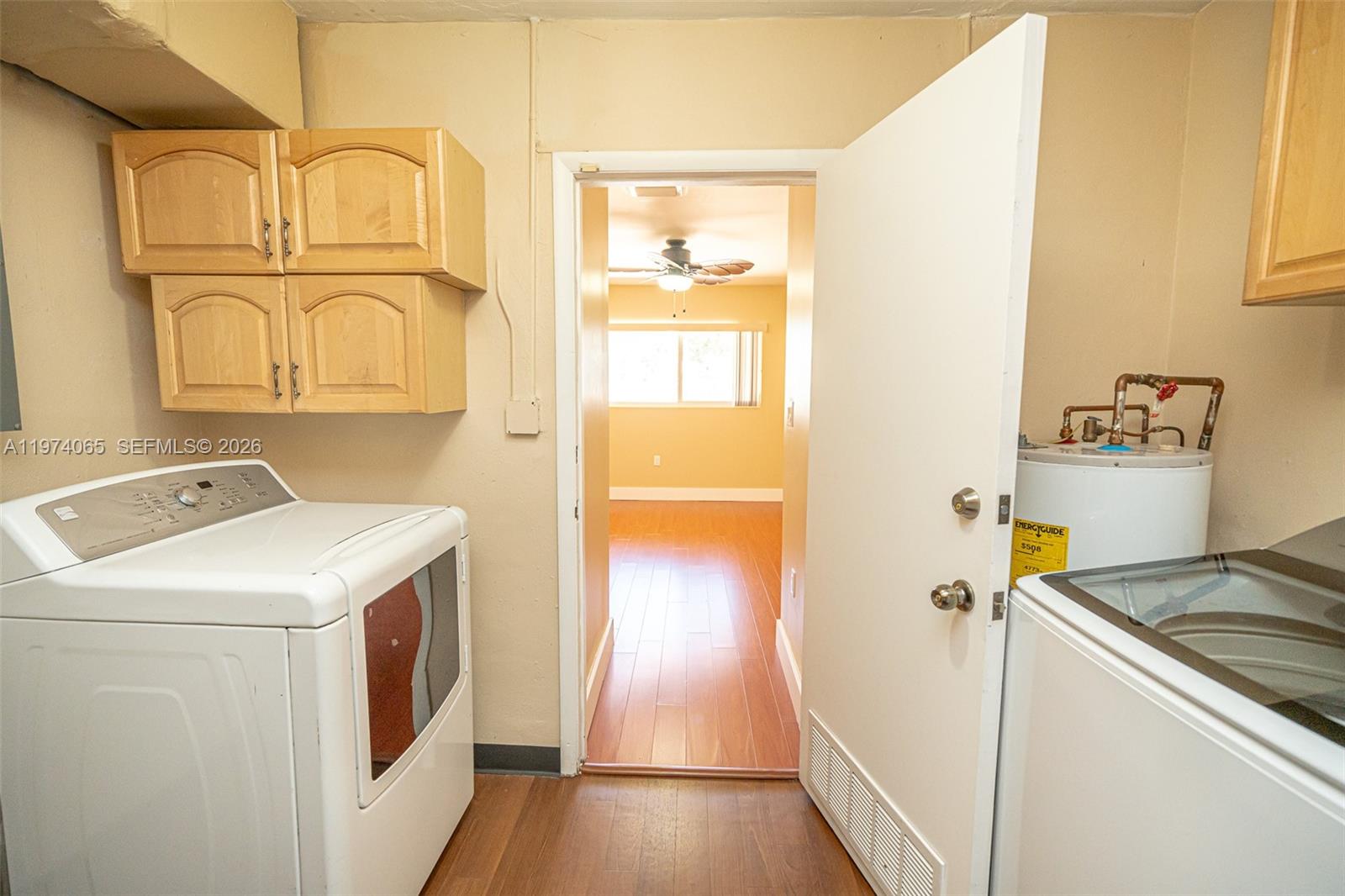 4600 Southwest 104th Avenue Miami, FL 33165 - Photo 36 of 40 a utility room with dryer and washer