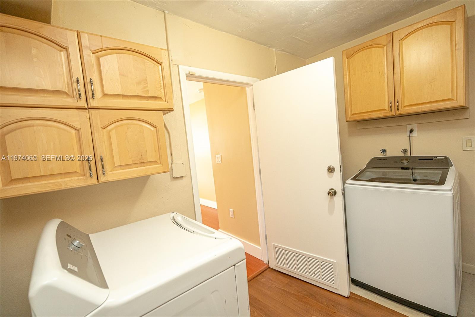 4600 Southwest 104th Avenue Miami, FL 33165 - Photo 37 of 40 a utility room with a sink washer and dryer